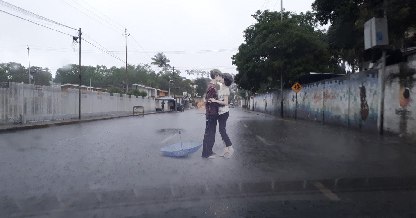 Pareja que se besa románticamente bajo la lluvia no sabe que viene una vaguada