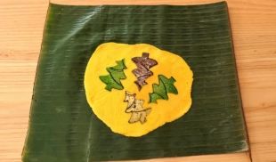 Mamá rellena hallacas con bombones de Cacao Lab para que los niños sí se las coman